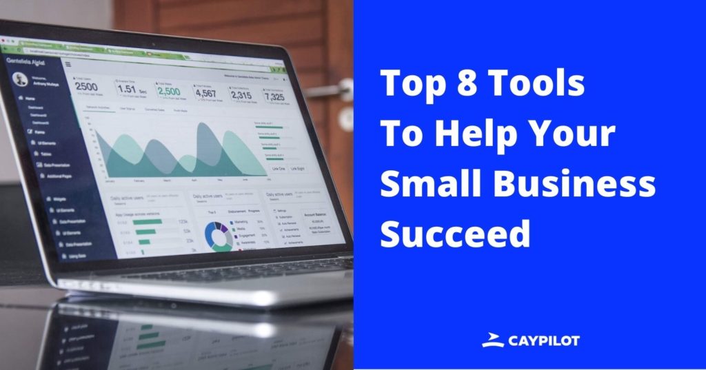 laptop laying on the table, top tools for small business
